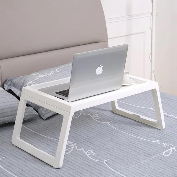 Portable Non-Slip Foldable Plastic table with slots to put a laptop or phone